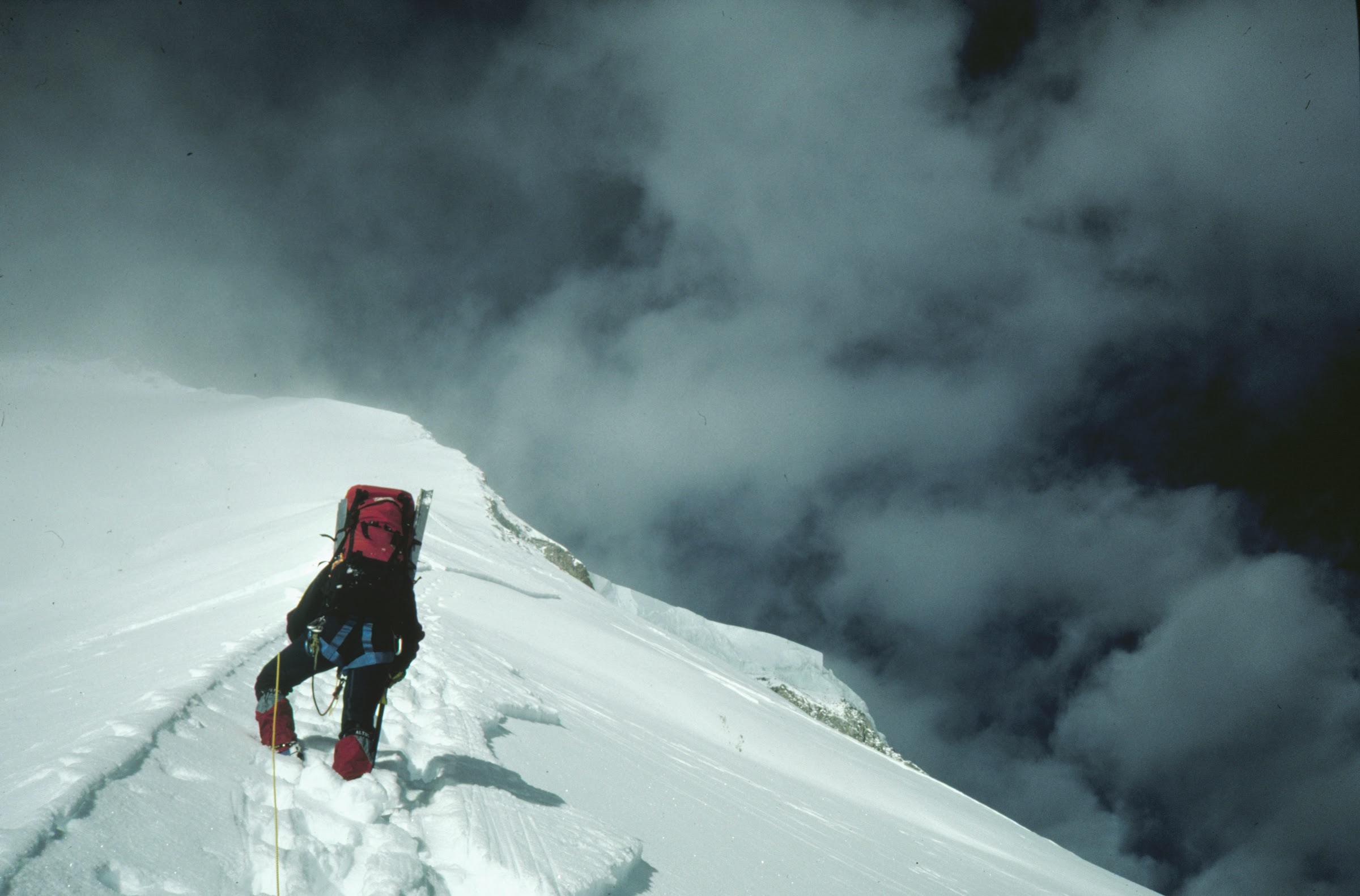 A climber on the Dhaulagiri spur among the clouds, 1990